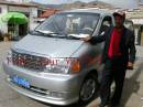 Tibet tour driver and tour van  » Click to zoom ->